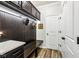 Convenient mudroom with bench seating, hooks, and storage cabinets at 4204 Omaha Dr, Bargersville, IN 46106