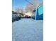 Gravel driveway and blue garage provide ample parking space at 424 S Parker Ave, Indianapolis, IN 46201