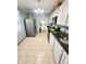 Well-lit kitchen featuring modern appliances, countertops, and ample cabinet space at 424 S Parker Ave, Indianapolis, IN 46201