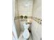 This toilet room features decorative tile work and a modern toilet at 424 S Parker Ave, Indianapolis, IN 46201