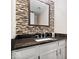 Bathroom featuring a decorative mirror, granite countertops and a sink at 4316 Village Trace Dr, Indianapolis, IN 46254