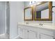 Bathroom featuring dual sinks and a mirror at 4316 Village Trace Dr, Indianapolis, IN 46254