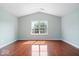 Bedroom with wood floors, a vaulted ceiling and a window at 4316 Village Trace Dr, Indianapolis, IN 46254