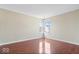 Bedroom with wood floors and two windows at 4316 Village Trace Dr, Indianapolis, IN 46254