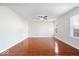 Large living area featuring hardwood floors and abundant natural light at 4316 Village Trace Dr, Indianapolis, IN 46254