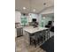 Stylish kitchen featuring white cabinets, granite countertops, and a functional island at 4336 Bittersweet Ln, Greenwood, IN 46142