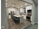 Open kitchen with stainless steel appliances, an island with bar seating, and ample storage at 4336 Bittersweet Ln, Greenwood, IN 46142