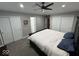 Spacious main bedroom with white closet doors, a ceiling fan and neutral paint colors at 4336 Bittersweet Ln, Greenwood, IN 46142