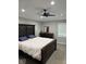 Spacious main bedroom with a ceiling fan, neutral colors, and closet space at 4336 Bittersweet Ln, Greenwood, IN 46142