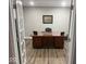 Office with a large wooden desk, neutral walls, and modern flooring at 4336 Bittersweet Ln, Greenwood, IN 46142
