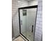 Modern shower with white subway tile and black hardware at 4336 Bittersweet Ln, Greenwood, IN 46142