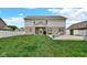 Enjoy the outdoor patio in this backyard, perfect for entertaining and relaxation at 4763 W Tradwell Dr, New Palestine, IN 46163