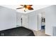 Bedroom featuring neutral walls, carpet flooring, and access to a walk-in closet for ample storage at 4763 W Tradwell Dr, New Palestine, IN 46163