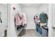 Walk-in closet with multiple storage racks and shelves to maximize organization and storage space at 4763 W Tradwell Dr, New Palestine, IN 46163