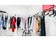 Walk-in closet with organized shelving and hanging racks, perfect for maximizing space and storage solutions at 4763 W Tradwell Dr, New Palestine, IN 46163