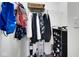 Closet with wire shelving and hanging racks; ideal for organization and storage, and a vacuum is stored here at 4763 W Tradwell Dr, New Palestine, IN 46163