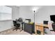 Well-lit home office space perfect for remote work, featuring functional setup and storage at 4763 W Tradwell Dr, New Palestine, IN 46163