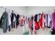 Walk-in closet with an array of organized clothing at 4763 W Tradwell Dr, New Palestine, IN 46163