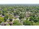 Beautiful aerial view of a neighborhood with mature trees and well-maintained houses at 5034 N Capitol Ave, Indianapolis, IN 46208