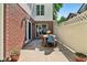 Cozy patio with a dining table and seating, perfect for outdoor dining and relaxation at 5034 N Capitol Ave, Indianapolis, IN 46208