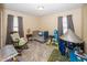 Bright bedroom featuring a crib, rocking chair, and ample space for play and relaxation at 540 Hanley St, Plainfield, IN 46168