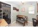 Cozy dining area adjacent to kitchen, featuring table with chairs and bench seating near laundry room at 540 Hanley St, Plainfield, IN 46168
