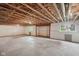 Bright, unfinished basement with exposed ceiling, awaiting personalization, and featuring natural light from the windows at 542 Hadleigh Ct, Westfield, IN 46074