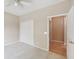 Bedroom featuring ceiling fan and closet; doorway to another room at 542 Hadleigh Ct, Westfield, IN 46074