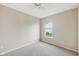 Bedroom with tan walls, carpeted floors, a ceiling fan, and a window at 542 Hadleigh Ct, Westfield, IN 46074