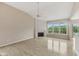 Bright, open living room featuring hardwood floors, fireplace, and a ceiling fan at 542 Hadleigh Ct, Westfield, IN 46074