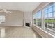 Bright, open living room featuring hardwood floors, fireplace, and lots of natural light at 542 Hadleigh Ct, Westfield, IN 46074