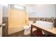 Well-lit bathroom featuring a combined shower and tub and a stylish vanity sink at 5622 Mead Ct, Indianapolis, IN 46220