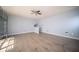 Spacious bedroom featuring neutral walls, wood-look flooring, and a ceiling fan at 5622 Mead Ct, Indianapolis, IN 46220