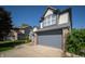 Close-up of a two-story home with a two-car garage and well-kept landscaping at 5622 Mead Ct, Indianapolis, IN 46220