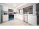 Modern kitchen with white cabinets and stainless steel appliances at 5622 Mead Ct, Indianapolis, IN 46220