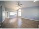 Spacious living room with wood floors and a ceiling fan at 5622 Mead Ct, Indianapolis, IN 46220