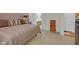Comfortable bedroom with access to the bathroom features neutral carpet and ample closet space at 575 Dylan Dr, Avon, IN 46123