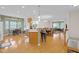 Bright and open kitchen with wooden floors flowing to living and dining spaces at 575 Dylan Dr, Avon, IN 46123