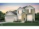 Beautiful two-story home with brick and siding accents, landscaped yard and attached two-car garage at 583 Dalton Way, Avon, IN 46123