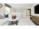 Upstairs loft area with comfortable seating, neutral decor, and a view of the outside at 583 Dalton Way, Avon, IN 46123