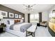 Serene main bedroom featuring neutral tones, soft lighting, and a view of the water at 583 Dalton Way, Avon, IN 46123