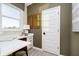 Well-lit home office space with a clean desk, modern decor, and a view from the window at 583 Dalton Way, Avon, IN 46123