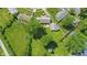 An aerial view shows the home's layout, including the backyard patio and detached garage at 633 Park Dr, Greenwood, IN 46143