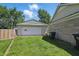 The backyard features a lawn and detached garage at 633 Park Dr, Greenwood, IN 46143