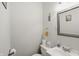 This half-bathroom offers a toilet and sink at 633 Park Dr, Greenwood, IN 46143
