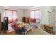 This bedroom has neutral walls and floors and ample natural light at 633 Park Dr, Greenwood, IN 46143