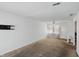 This spacious living room features neutral colors and a ceiling fan at 633 Park Dr, Greenwood, IN 46143