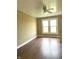 Bright bedroom with laminate floors, neutral walls, and a ceiling fan for added comfort at 660 N 700 E, Whitestown, IN 46075