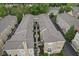 Aerial view of this stunning property showcasing manicured landscaping, multiple units, and a serene setting at 6665 Boxcar Pl, Indianapolis, IN 46220