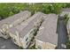 Stunning property showcases manicured landscaping, multiple units, and a serene setting in this aerial view at 6665 Boxcar Pl, Indianapolis, IN 46220